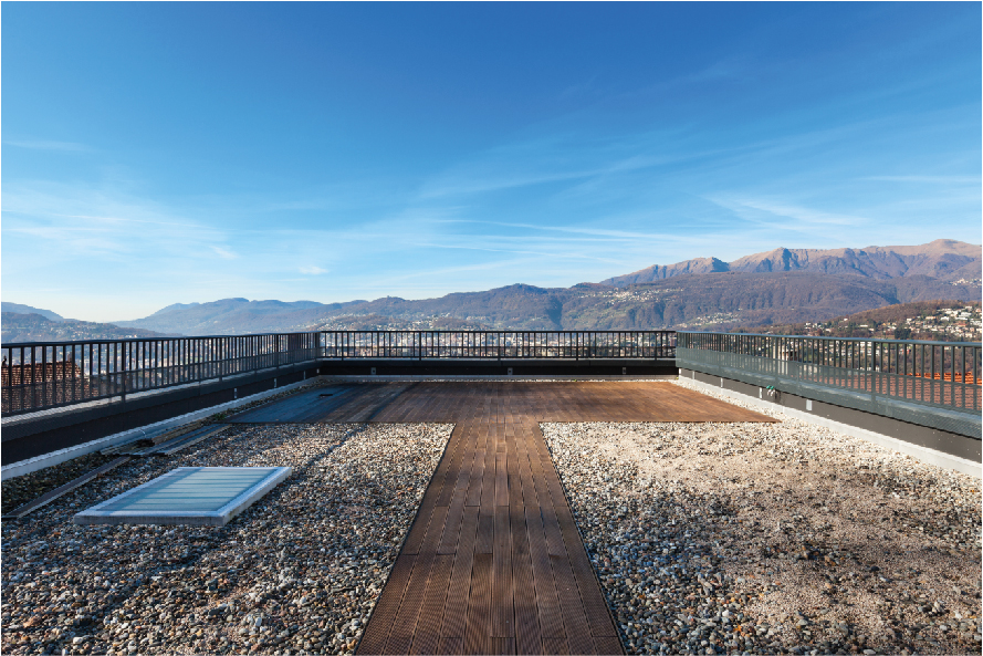 Toit plat bois et gravier entretenu